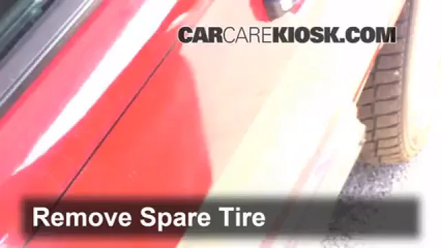 1984 Audi Coupe 2.2L 5 Cyl. Levantar auto Usar el gato para levantar el auto